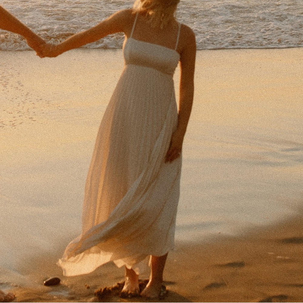 White pleated dress